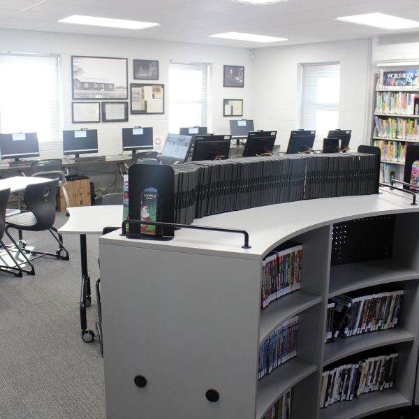 The main area at Bragtown, with DVD and book shelving, computers, and large tables