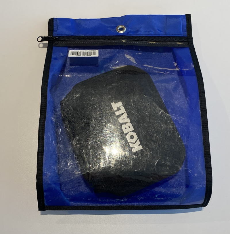 Blue zippered bag with a clear front, showing a black case inside that says KOBALT on it.